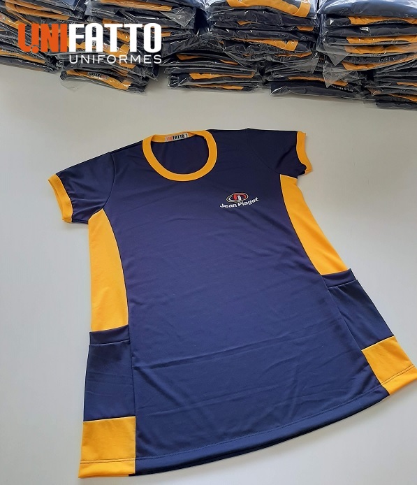 Imagem de Camiseta Mod. Bata para professoras em malha PV antipilling com logomarca em Bordado - Escola Jean Piaget